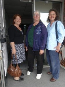 Tawnya, Karen, and Penny at the front door.