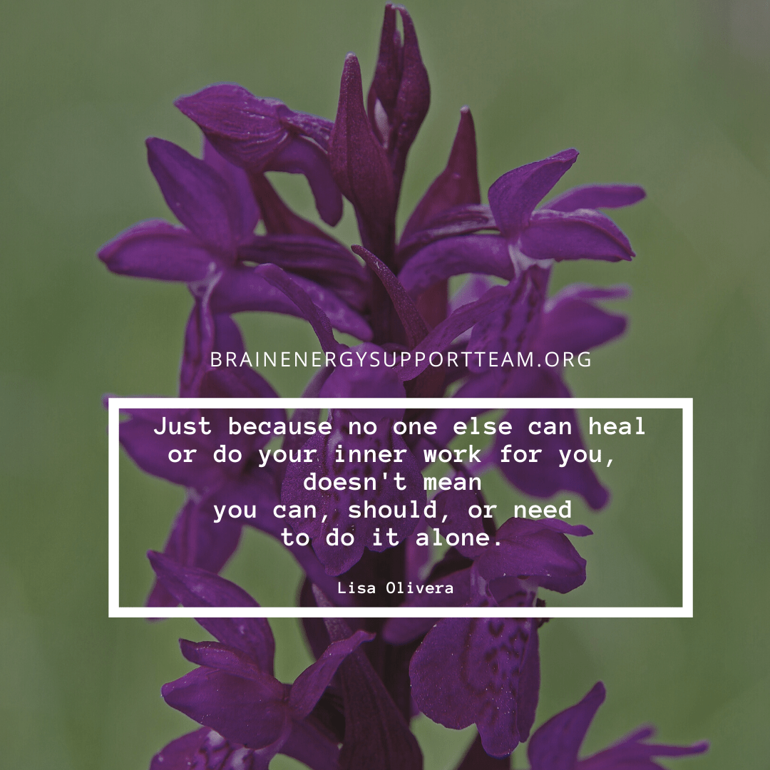 A close-up of a stem of purple spring flowers